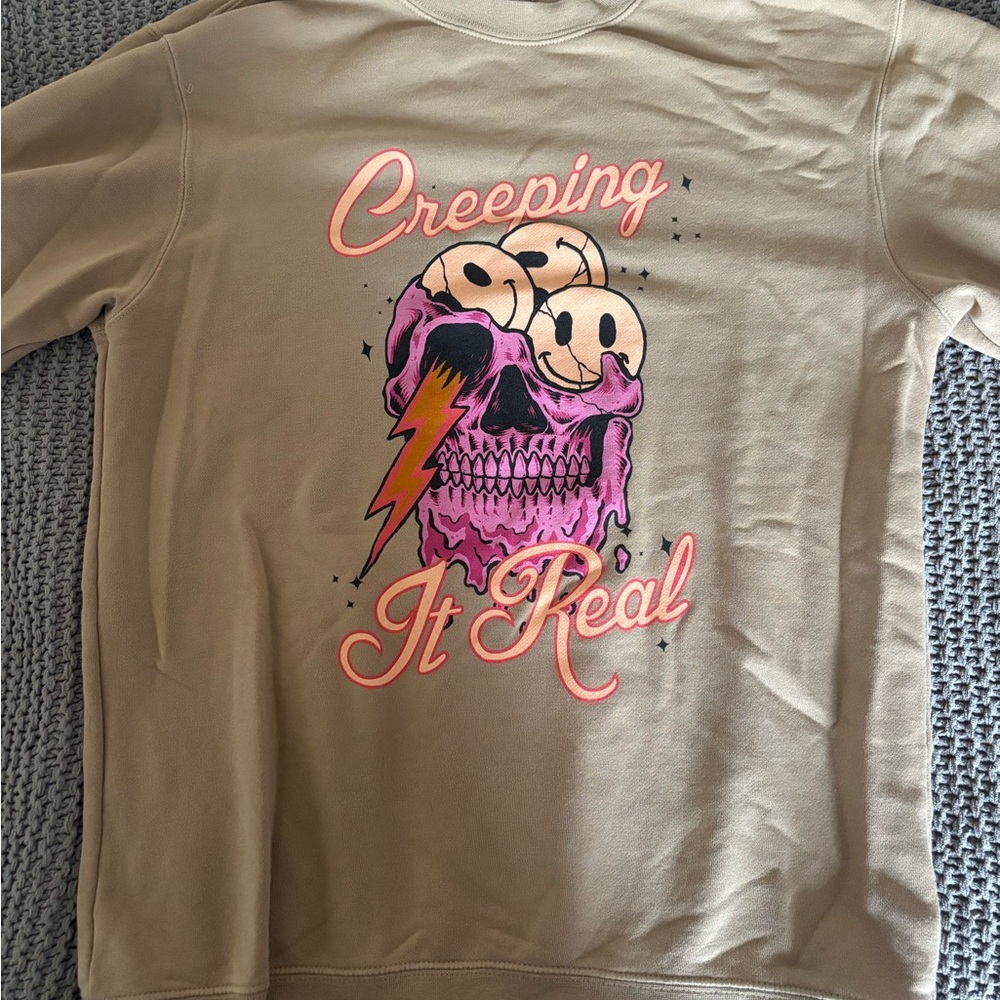 Tan Sweatshirt with Skull and Lightning Graphic